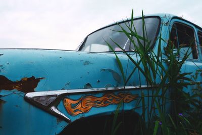 Low angle view of car against sky