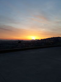 View of cityscape against sky during sunset