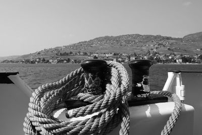 Panoramic view of boats in sea against clear sky