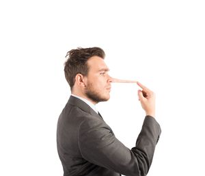 Side view of a man against white background