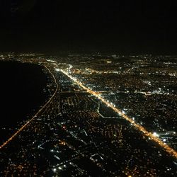 Aerial view of illuminated cityscape