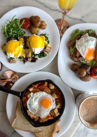 High angle view of breakfast served on table