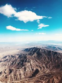 Aerial view of dramatic landscape against sky