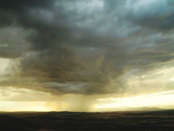 Storm clouds over landscape