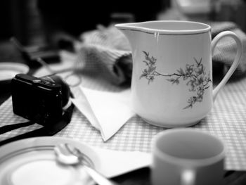 Close-up of coffee cup on table