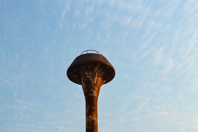 Low angle view of water tower against sky