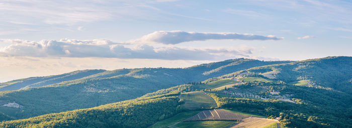 Aerial view of agricultural landscape against sky