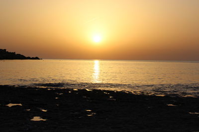 Scenic view of sea at sunset