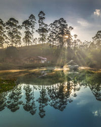 People are fishing at the morning with a beautiful scenery