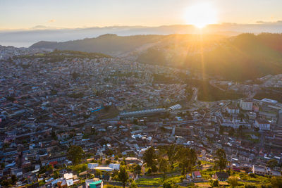 High angle view of townscape against sky during sunset