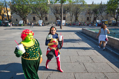 People walking on street in city