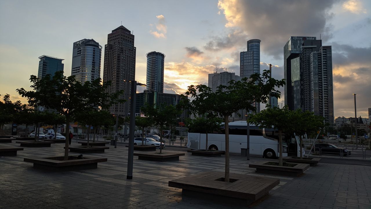 VIEW OF MODERN BUILDINGS AGAINST SKY