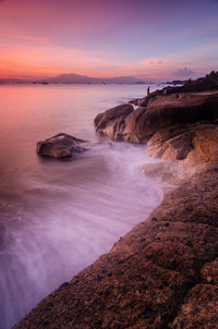 Scenic view of sea against sky at sunset