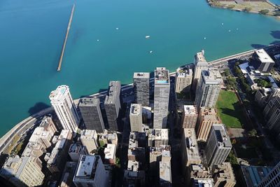 High angle view of cityscape by sea