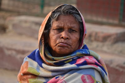 Close-up portrait of woman in winter