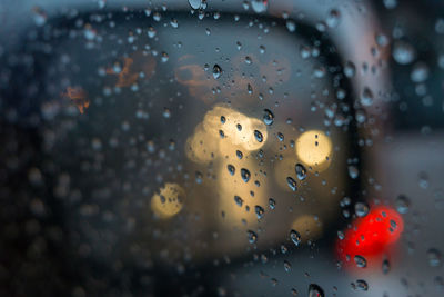 Close-up of wet car window