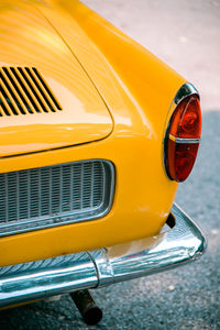 Close-up of yellow car