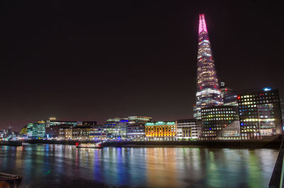 Illuminated city lit up at night