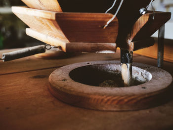 Cropped image of person preparing food on table