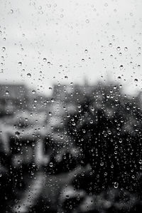 Full frame shot of wet glass window