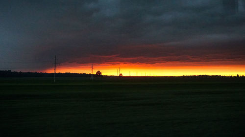 Scenic view of dramatic sky during sunset