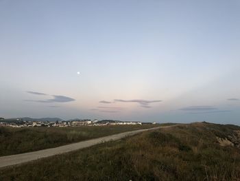 Scenic view of landscape against sky during sunset