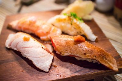 Close-up of japanese food served on cutting board