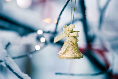 Close-up of christmas decoration hanging on tree