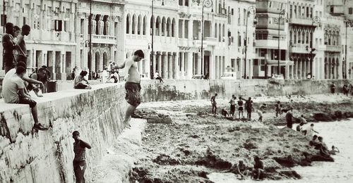 Woman standing in front of building