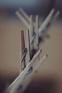 Close-up of clothespins on table
