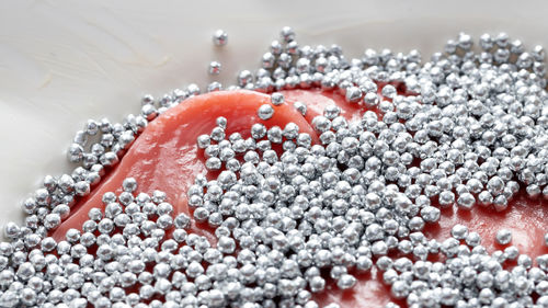 Close-up of frozen water in container