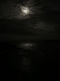 Scenic view of sea against sky at night