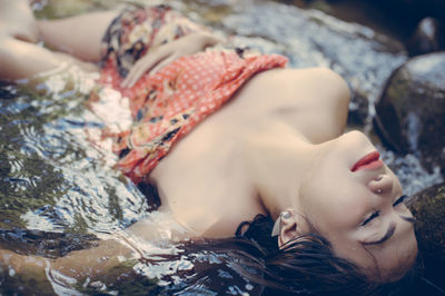 High angle view of woman relaxing outdoors