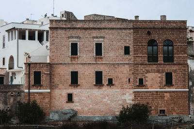 Low angle view of old building against sky