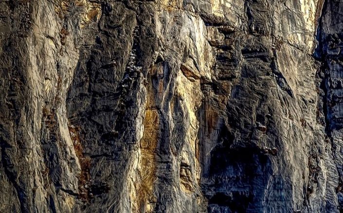 LOW ANGLE VIEW OF ROCK FORMATIONS