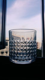 Close-up of glass jar on table