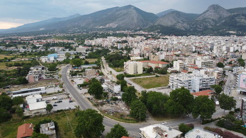 High angle view of townscape and mountains