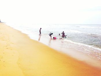 Tourists enjoying on beach