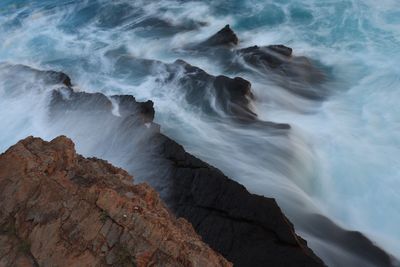 Scenic view of rocky beach