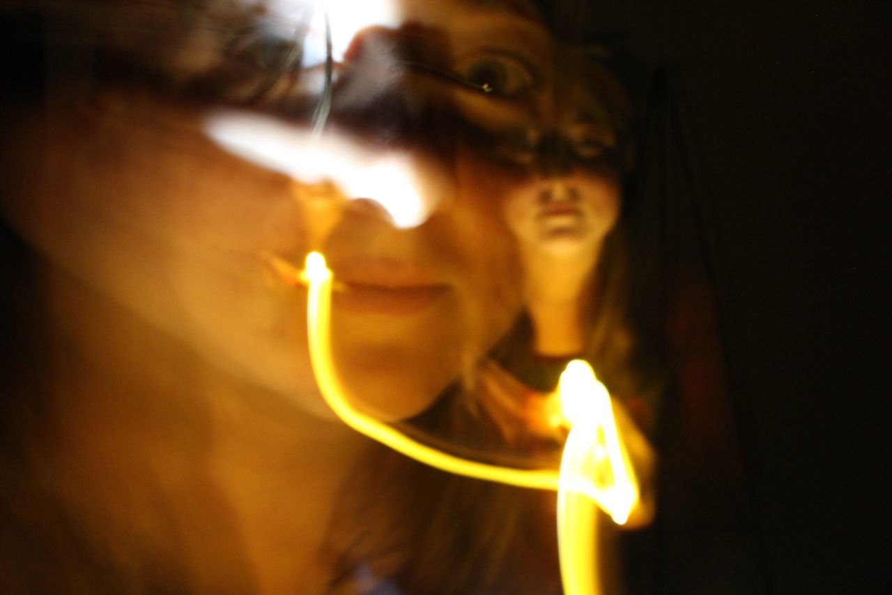 flame, burning, glowing, heat - temperature, one person, illuminated, candle, close-up, focus on foreground, indoors, real people, night, young women, young adult, people