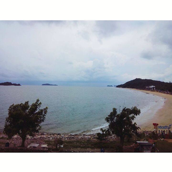 sea, water, sky, transfer print, horizon over water, tree, scenics, tranquil scene, cloud - sky, tranquility, auto post production filter, beauty in nature, nature, beach, cloud, cloudy, coastline, shore, building exterior, built structure