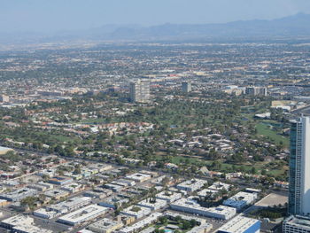 High angle view of buildings in city against sky