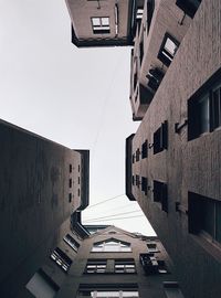 Low angle view of buildings against clear sky