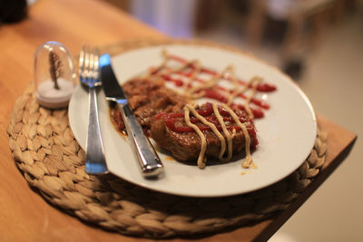 Close-up of cake in plate on table
