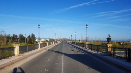 View of road against blue sky