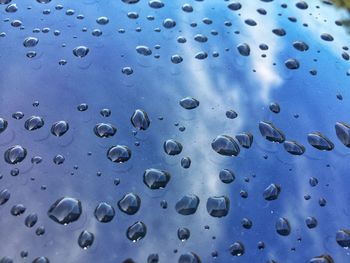 Close-up of water drops on glass window