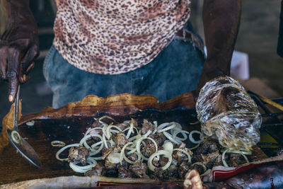 Close-up of man preparing food