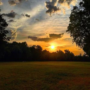 Scenic view of landscape at sunset