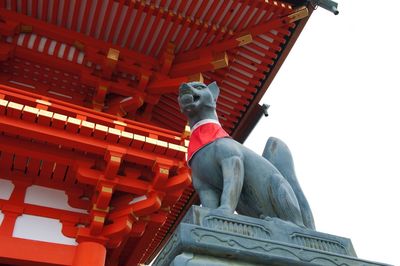 Low angle view of statue against sky