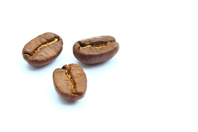 Close-up of bread against white background